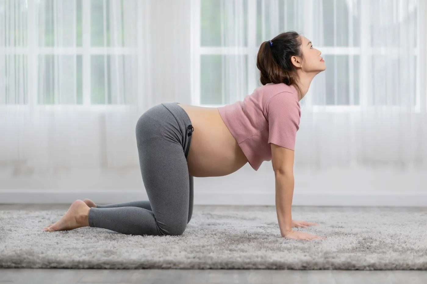 Cat–Cow pose - pregnancy yoga poses
